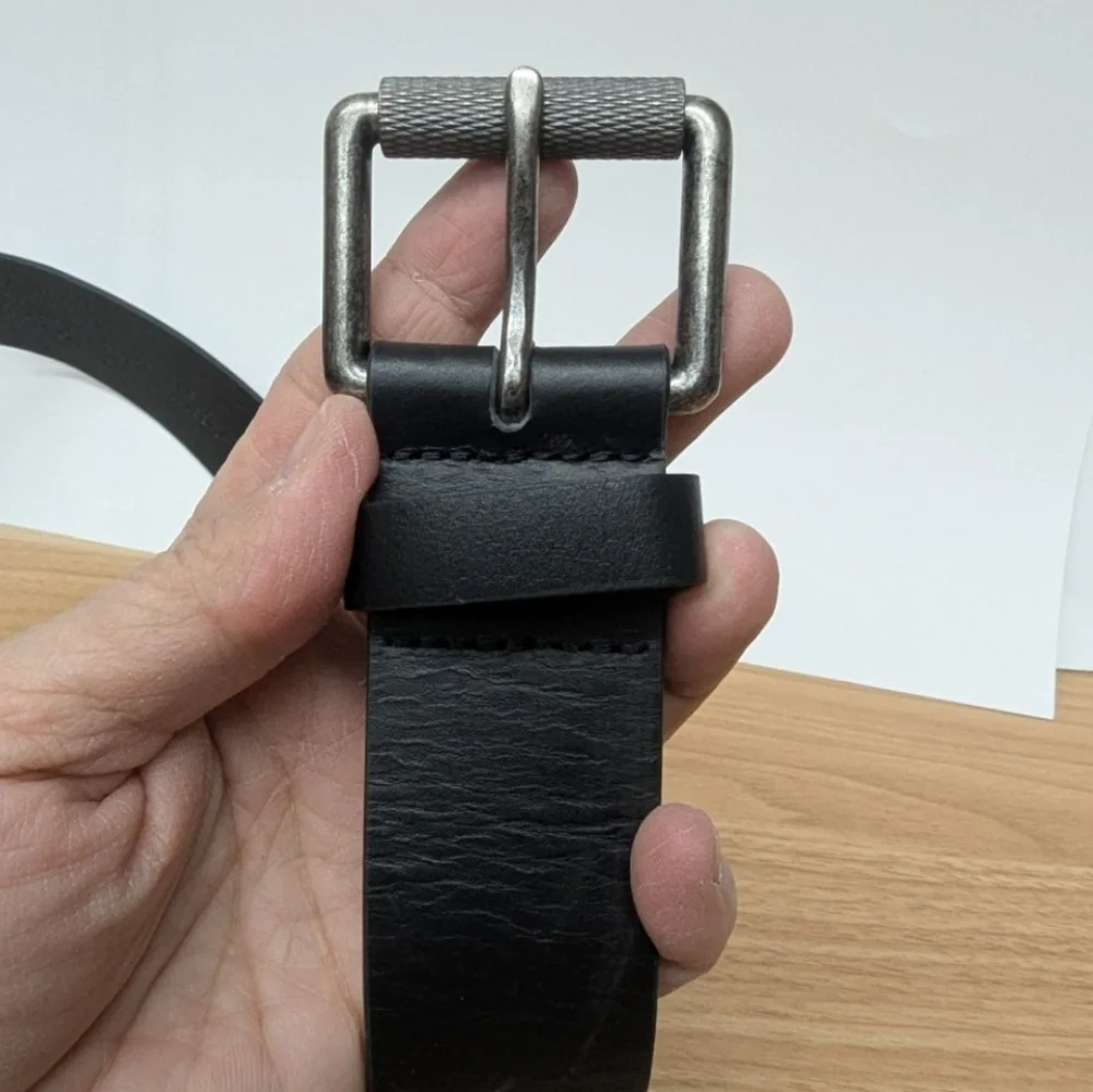 Black genuine leather belt in used condition
